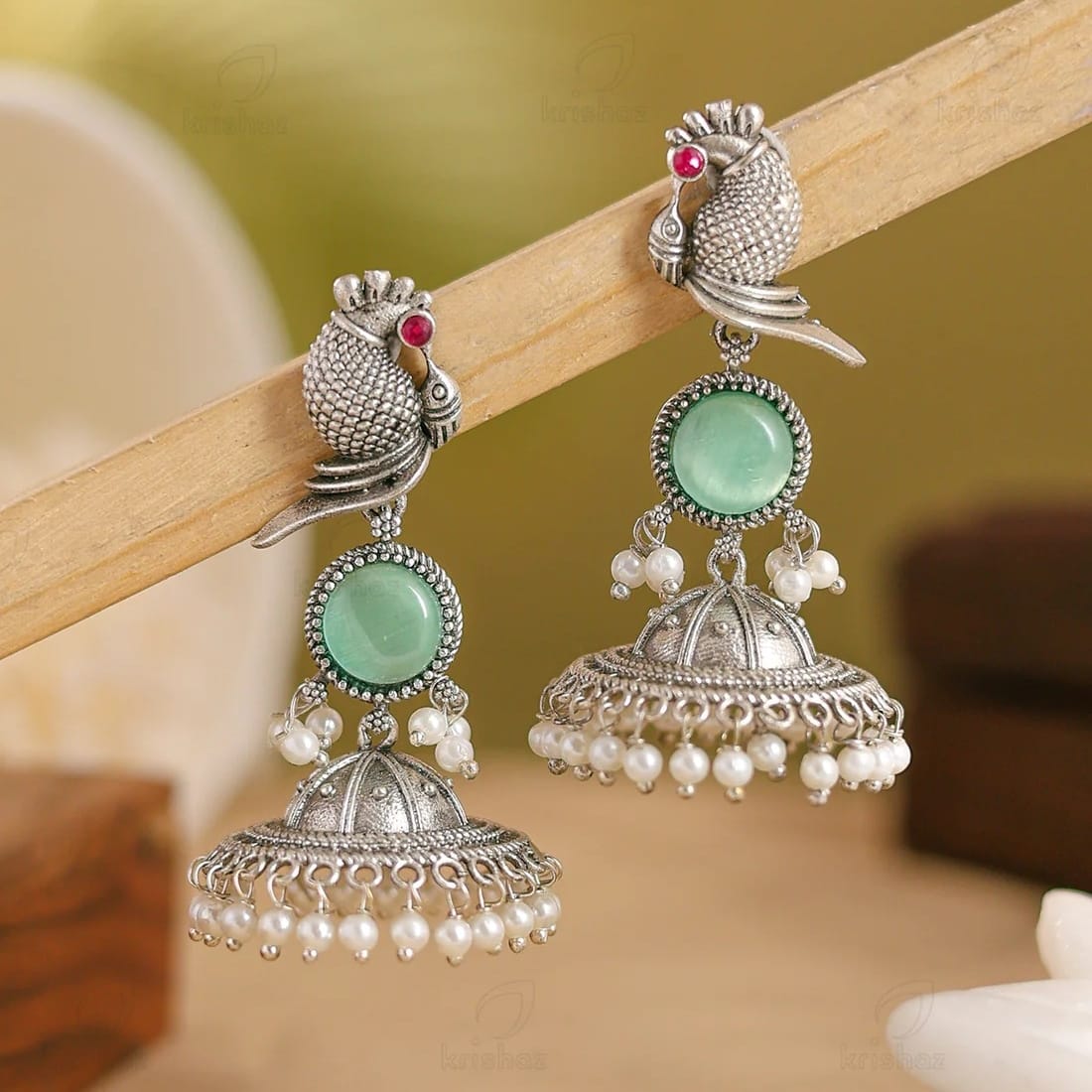 Oxidised Silver Parrot Jhumka Earrings with Mint Green Stone & Pearl Drops